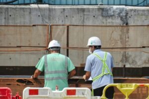 a few men wearing hardhats