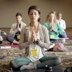 group of people doing yoga